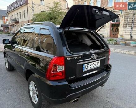 Чорний Кіа Sportage, об'ємом двигуна 2 л та пробігом 211 тис. км за 7700 $, фото 13 на Automoto.ua