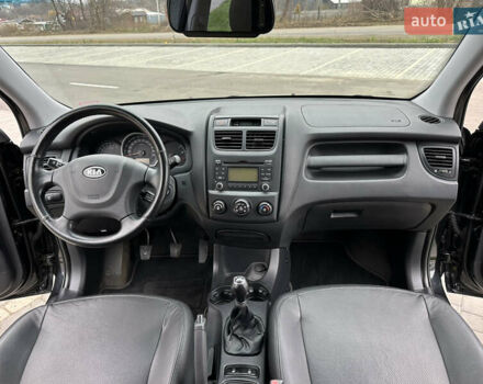 Черный Киа Sportage, объемом двигателя 2 л и пробегом 157 тыс. км за 8999 $, фото 24 на Automoto.ua