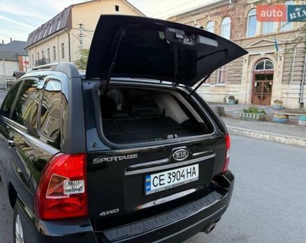 Чорний Кіа Sportage, об'ємом двигуна 2 л та пробігом 211 тис. км за 7700 $, фото 14 на Automoto.ua