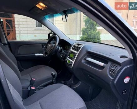 Чорний Кіа Sportage, об'ємом двигуна 2 л та пробігом 211 тис. км за 7700 $, фото 24 на Automoto.ua