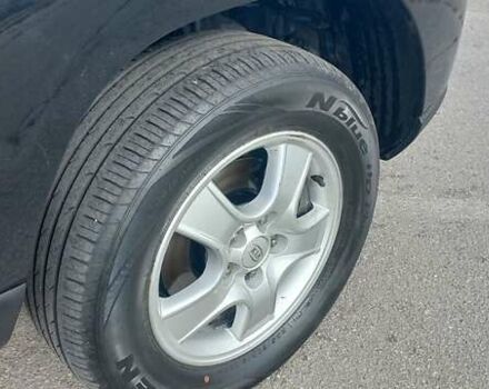 Чорний Кіа Sportage, об'ємом двигуна 2 л та пробігом 167 тис. км за 8999 $, фото 16 на Automoto.ua