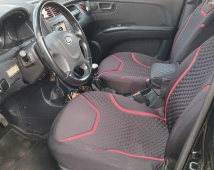 Черный Киа Sportage, объемом двигателя 2 л и пробегом 245 тыс. км за 8000 $, фото 6 на Automoto.ua