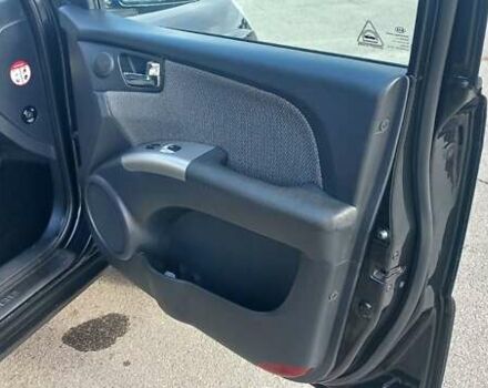 Чорний Кіа Sportage, об'ємом двигуна 2 л та пробігом 167 тис. км за 8999 $, фото 24 на Automoto.ua