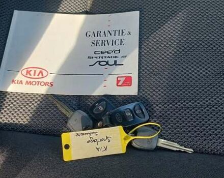 Чорний Кіа Sportage, об'ємом двигуна 2 л та пробігом 167 тис. км за 8999 $, фото 59 на Automoto.ua