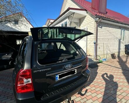 Черный Киа Sportage, объемом двигателя 2 л и пробегом 195 тыс. км за 9000 $, фото 8 на Automoto.ua