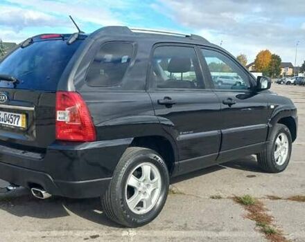 Чорний Кіа Sportage, об'ємом двигуна 2 л та пробігом 167 тис. км за 8999 $, фото 2 на Automoto.ua