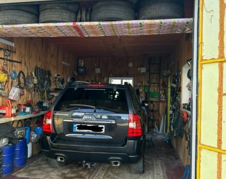 Черный Киа Sportage, объемом двигателя 2 л и пробегом 195 тыс. км за 9000 $, фото 10 на Automoto.ua