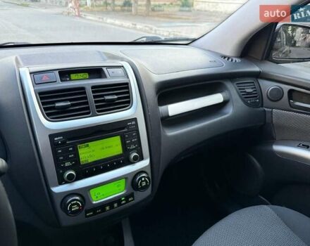 Чорний Кіа Sportage, об'ємом двигуна 2 л та пробігом 211 тис. км за 7700 $, фото 27 на Automoto.ua