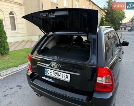 Чорний Кіа Sportage, об'ємом двигуна 2 л та пробігом 211 тис. км за 7700 $, фото 17 на Automoto.ua