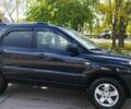 Черный Киа Sportage, объемом двигателя 2 л и пробегом 245 тыс. км за 8000 $, фото 2 на Automoto.ua