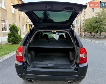 Чорний Кіа Sportage, об'ємом двигуна 2 л та пробігом 211 тис. км за 7700 $, фото 18 на Automoto.ua