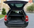 Чорний Кіа Sportage, об'ємом двигуна 2 л та пробігом 211 тис. км за 7700 $, фото 18 на Automoto.ua