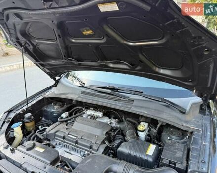 Чорний Кіа Sportage, об'ємом двигуна 2 л та пробігом 211 тис. км за 7700 $, фото 31 на Automoto.ua