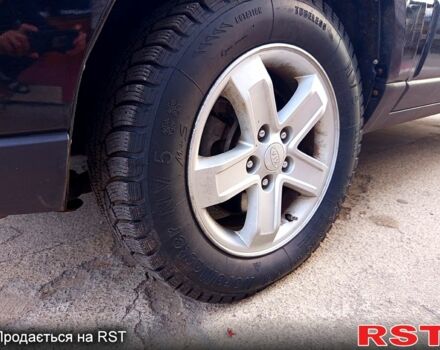 Черный Киа Sportage, объемом двигателя 2 л и пробегом 290 тыс. км за 9100 $, фото 11 на Automoto.ua