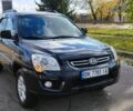 Черный Киа Sportage, объемом двигателя 2 л и пробегом 245 тыс. км за 8000 $, фото 1 на Automoto.ua