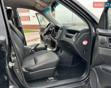 Черный Киа Sportage, объемом двигателя 2 л и пробегом 157 тыс. км за 8999 $, фото 19 на Automoto.ua