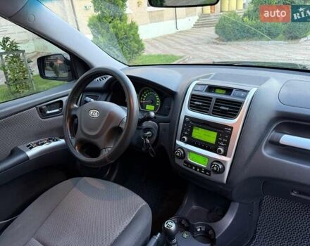 Чорний Кіа Sportage, об'ємом двигуна 2 л та пробігом 211 тис. км за 7700 $, фото 26 на Automoto.ua