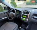 Чорний Кіа Sportage, об'ємом двигуна 2 л та пробігом 211 тис. км за 7700 $, фото 26 на Automoto.ua