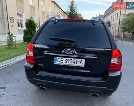 Чорний Кіа Sportage, об'ємом двигуна 2 л та пробігом 211 тис. км за 7700 $, фото 7 на Automoto.ua