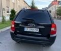Чорний Кіа Sportage, об'ємом двигуна 2 л та пробігом 211 тис. км за 7700 $, фото 7 на Automoto.ua