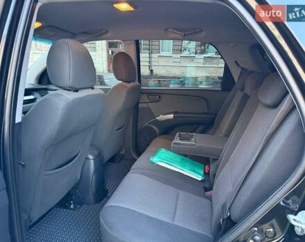 Чорний Кіа Sportage, об'ємом двигуна 2 л та пробігом 211 тис. км за 7700 $, фото 22 на Automoto.ua