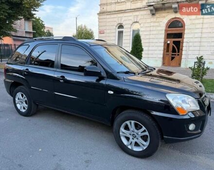 Чорний Кіа Sportage, об'ємом двигуна 2 л та пробігом 211 тис. км за 7700 $, фото 5 на Automoto.ua