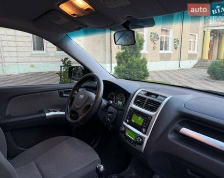 Чорний Кіа Sportage, об'ємом двигуна 2 л та пробігом 211 тис. км за 7700 $, фото 25 на Automoto.ua