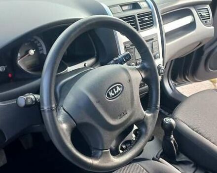 Чорний Кіа Sportage, об'ємом двигуна 2 л та пробігом 167 тис. км за 8999 $, фото 30 на Automoto.ua