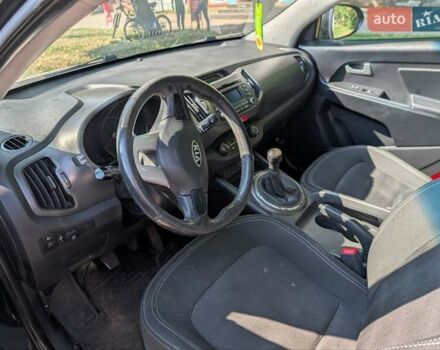 Чорний Кіа Sportage, об'ємом двигуна 2 л та пробігом 271 тис. км за 10500 $, фото 5 на Automoto.ua
