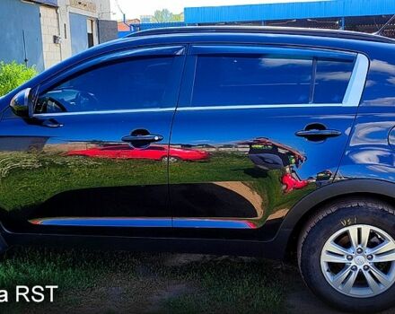 Чорний Кіа Sportage, об'ємом двигуна 2 л та пробігом 240 тис. км за 11200 $, фото 13 на Automoto.ua