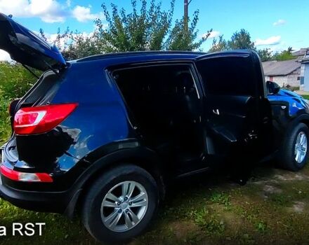 Чорний Кіа Sportage, об'ємом двигуна 2 л та пробігом 240 тис. км за 11200 $, фото 4 на Automoto.ua