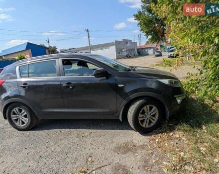 Чорний Кіа Sportage, об'ємом двигуна 2 л та пробігом 271 тис. км за 10500 $, фото 1 на Automoto.ua