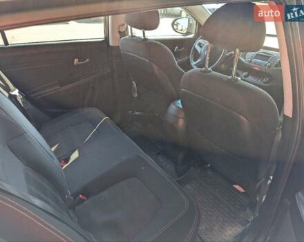 Чорний Кіа Sportage, об'ємом двигуна 2 л та пробігом 271 тис. км за 10500 $, фото 9 на Automoto.ua