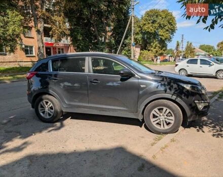 Чорний Кіа Sportage, об'ємом двигуна 2 л та пробігом 271 тис. км за 10500 $, фото 2 на Automoto.ua