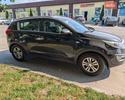 Чорний Кіа Sportage, об'ємом двигуна 2 л та пробігом 271 тис. км за 10500 $, фото 4 на Automoto.ua