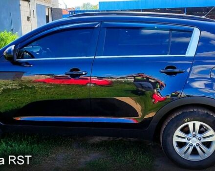 Чорний Кіа Sportage, об'ємом двигуна 2 л та пробігом 240 тис. км за 11200 $, фото 12 на Automoto.ua
