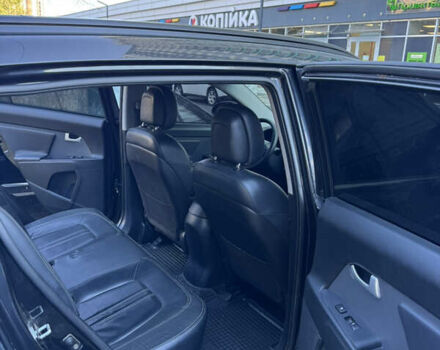 Черный Киа Sportage, объемом двигателя 2 л и пробегом 225 тыс. км за 13750 $, фото 14 на Automoto.ua