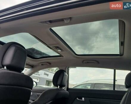 Черный Киа Sportage, объемом двигателя 2 л и пробегом 256 тыс. км за 12800 $, фото 2 на Automoto.ua