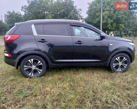 Чорний Кіа Sportage, об'ємом двигуна 2 л та пробігом 150 тис. км за 11500 $, фото 7 на Automoto.ua