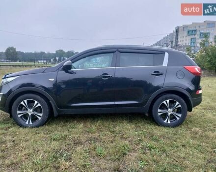 Чорний Кіа Sportage, об'ємом двигуна 2 л та пробігом 150 тис. км за 11500 $, фото 2 на Automoto.ua