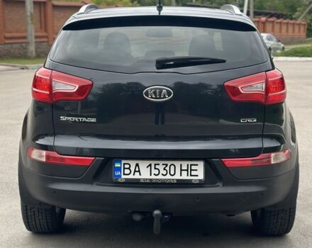 Чорний Кіа Sportage, об'ємом двигуна 2 л та пробігом 218 тис. км за 12799 $, фото 7 на Automoto.ua