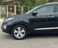 Чорний Кіа Sportage, об'ємом двигуна 2 л та пробігом 218 тис. км за 12799 $, фото 4 на Automoto.ua