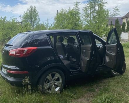Чорний Кіа Sportage, об'ємом двигуна 2.4 л та пробігом 165 тис. км за 10000 $, фото 1 на Automoto.ua