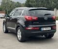 Чорний Кіа Sportage, об'ємом двигуна 2 л та пробігом 218 тис. км за 12799 $, фото 6 на Automoto.ua