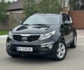 Чорний Кіа Sportage, об'ємом двигуна 2 л та пробігом 218 тис. км за 12799 $, фото 1 на Automoto.ua