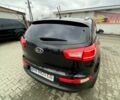 Чорний Кіа Sportage, об'ємом двигуна 2 л та пробігом 105 тис. км за 12500 $, фото 1 на Automoto.ua