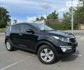 Чорний Кіа Sportage, об'ємом двигуна 2 л та пробігом 341 тис. км за 10600 $, фото 1 на Automoto.ua