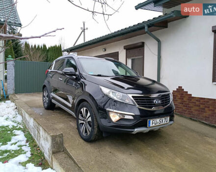 Черный Киа Sportage, объемом двигателя 2 л и пробегом 209 тыс. км за 14599 $, фото 26 на Automoto.ua