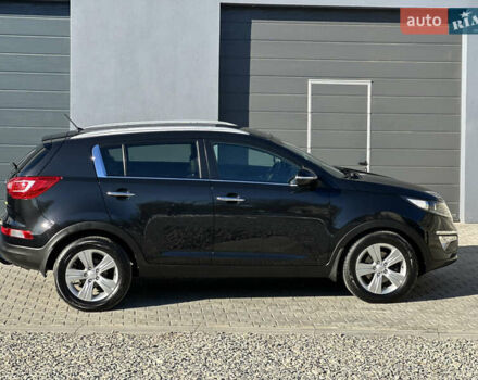 Черный Киа Sportage, объемом двигателя 1.7 л и пробегом 206 тыс. км за 12100 $, фото 14 на Automoto.ua