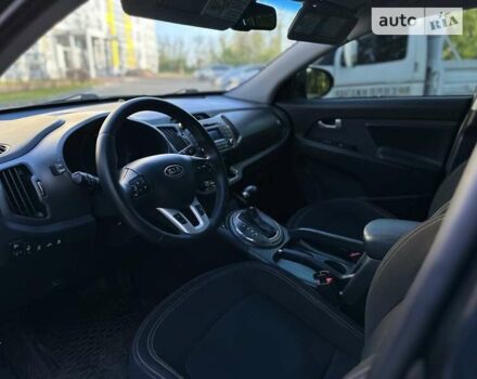 Чорний Кіа Sportage, об'ємом двигуна 2 л та пробігом 207 тис. км за 11800 $, фото 18 на Automoto.ua